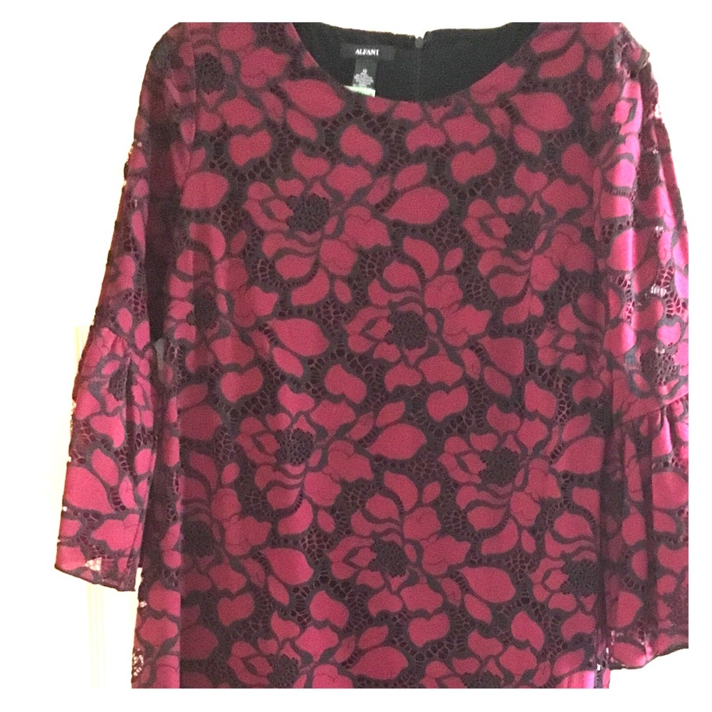 This dress is so pretty. Worn 1 x and dry cleaned.